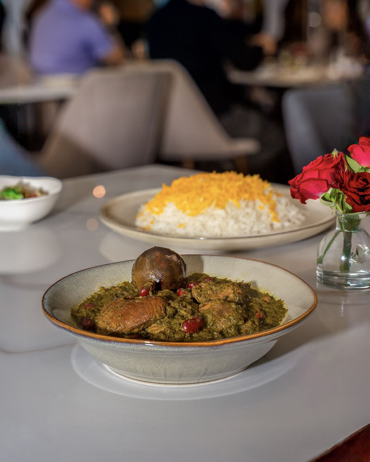 Ghormeh sabzi and saffron basmati rice in the Westwood dining room in Westwood Village